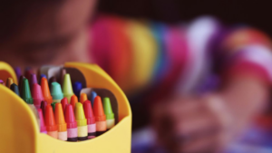 Out of focus child colouring in