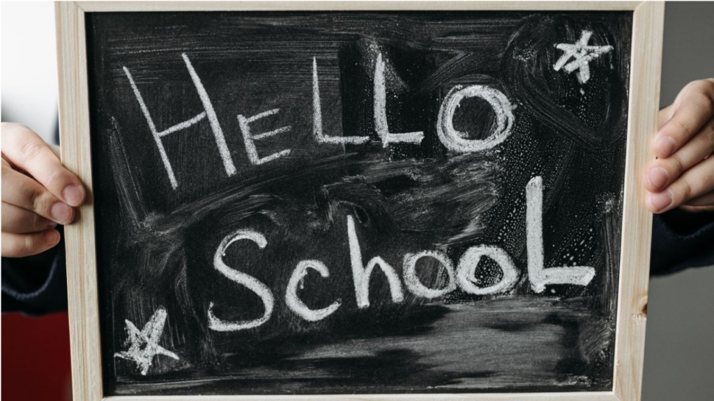 Chalkboard with HELLO SCHOOL written on it